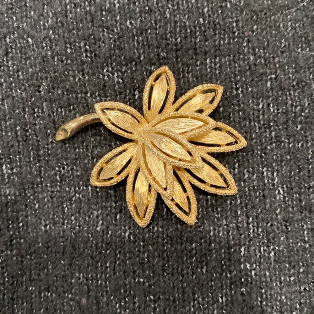 Vintage Avon lotus brooch